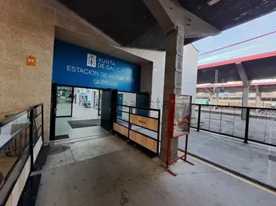 an entrance to a train station with a sign on it at Don Xesús in Ourense