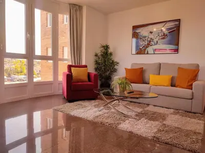 a living room with a couch and a table at Monforte in Monforte de Lemos
