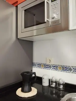 a coffee pot sitting on a counter in a kitchen at VUT Mencía in Ponferrada