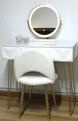 a white dressing table with a white chair and a mirror at A Ledicia no camiño in Melide