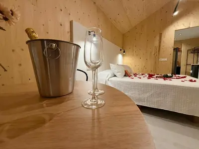 a mirror on a shelf in a kitchen at Cabañas Camiño do Mar in Foz