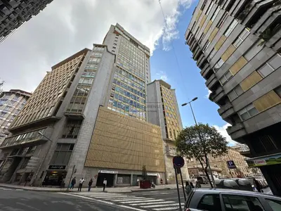 a tall building on a city street with buildings at Balcón da Habana in Ourense
