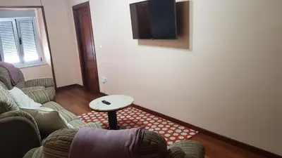 a living room with two couches and a table at CASA LOZANO in Barreiros