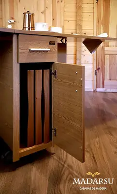 a kitchen with a wooden counter with a sink at Cabañas Madarsu in Vigo de Sanabria