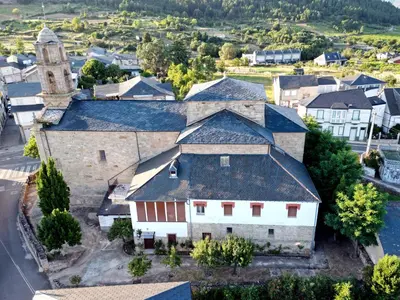 an aerial view of a small town with a church at O lar Albergue Larouco in Laroco