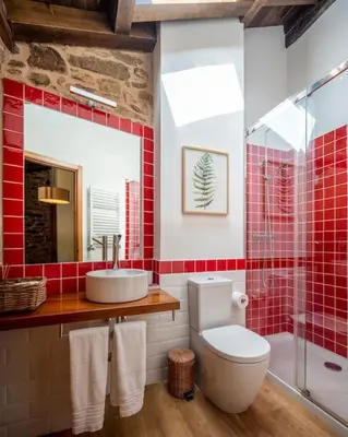 a bathroom with a toilet and a sink and a shower at Casa Peón de Pardaces in Santiago de Compostela