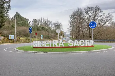 a sign on the side of a road at YourHouse Fontevella II in Ourense