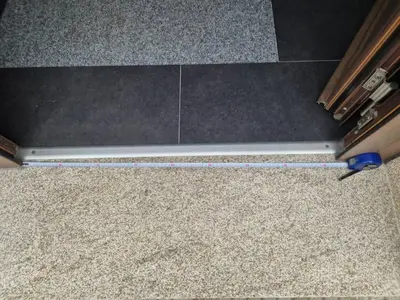 a cleaning tool on a floor with a carpet at Sienna Home Apartamento in Santiago de Compostela