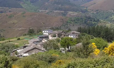 a group of houses on a hill in a valley at Casa Rural de alquiler integro La Cantina de Villarmayor-Asturias in Villarmayor