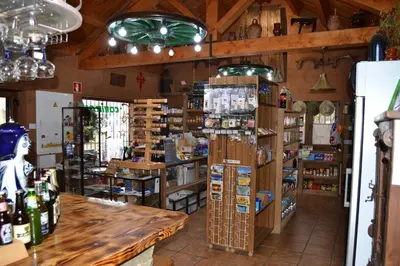 a room with a store with a lot of products at El Trasgu de Foncebadón in Foncebadón