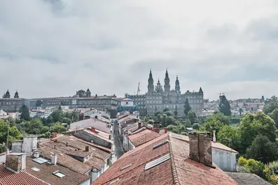 a view of a city with buildings and roofs at 9Estudio Sightviews in Santiago de Compostela