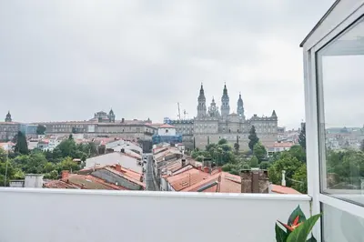 a view of a city from a window at 9Estudio Sightviews in Santiago de Compostela