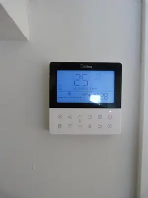 a digital clock on a wall on a wall at Foroplaza Duplex in Lugo