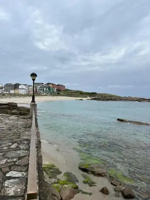a light pole on the shore of a beach at La Atalaya de Sanci in San Ciprián