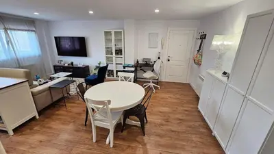 a living room with a white table and chairs at Costa verde asturiana - VUT4692AS in El Espín