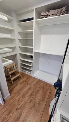 a closet with white shelves and a wooden floor at Costa verde asturiana - VUT4692AS in El Espín