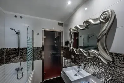 a bathroom with a sink and a mirror at Motel Venus La Coruña in Guísamo