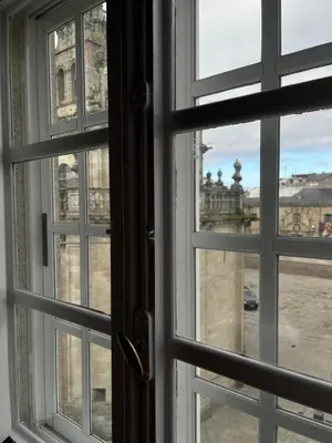 a view from a window looking out at the city at Santa María in Lugo