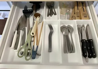 a drawer filled with lots of kitchen utensils at Apartamento con vistas al río in Betanzos