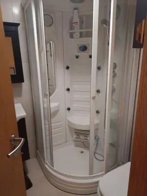 a bathroom with a shower and a sink at Foz te espera in Foz
