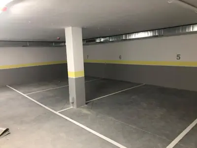 an empty parking garage with a pole in it at Aparthotel A&M VIÑA II in Jove