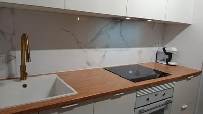a kitchen with a sink and a counter top at Floor en Forcarei in Forcarei