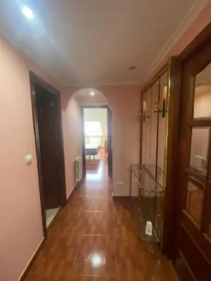 a hallway of a house with a wooden floor at Monte Faro in Lalín