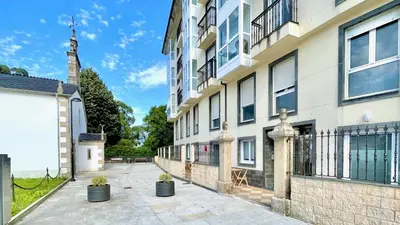 an empty street in front of a building at The Cliffs - AT Seiramar Os Castelos in Viveiro
