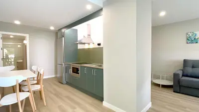 a kitchen and dining room with a table and chairs at The Cliffs - AT Seiramar Area in Viveiro
