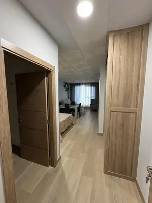 an open door to a room with a bedroom at Apartamentos Turisticos Peregrin Palas in Palas de Rei