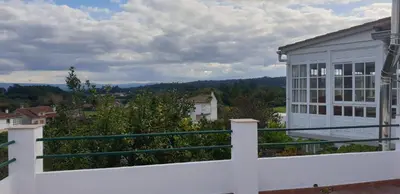 a view from the balcony of a house at Villa Victoria in Teo