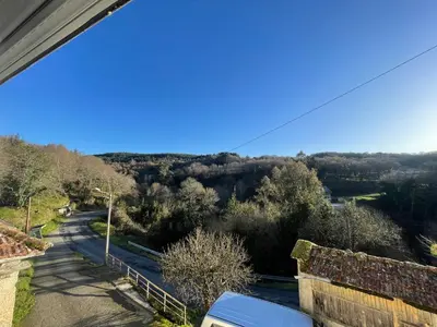 a view from the balcony of a house with a road at Casa da Greta in Parada del Monte