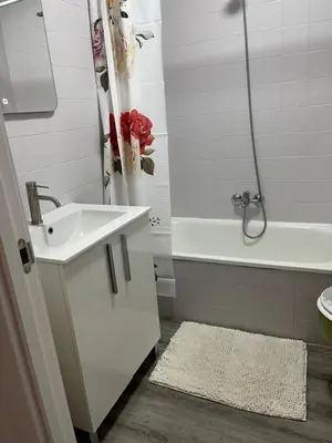 a bathroom with a sink and a tub and a shower at Universidad Piso Artur II in Ourense