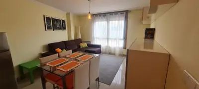 a small living room with a couch and a table at Ribeiras do Tamega in Verín