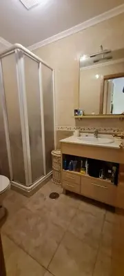 a bathroom with a sink and a mirror at Ribeiras do Tamega in Verín