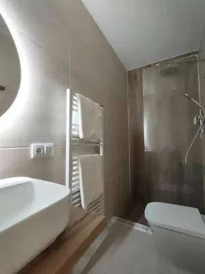 a bathroom with a sink and a toilet and a shower at Casa Rectoral de Rante in Rante