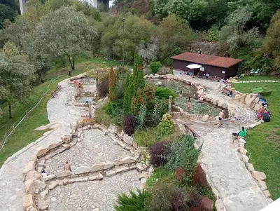 a group of people playing in a water park at A Feitiña de Rubiacós in Rubiacós