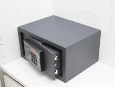 a black microwave oven sitting on top of a counter at Bolboreta Apartments by Como en Casa in Santiago de Compostela