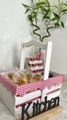 a basket of donuts and pastries on a table at Gallaecia Dúplex in Arzúa