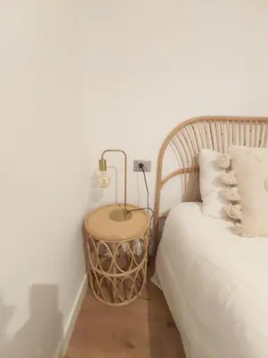 a large bed with a green blanket and pillows at YourHouse Ourense Bello 2 Loft in Ourense