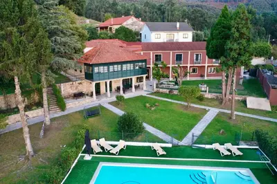 an aerial view of a house with a swimming pool at Hotel Rural VN Tenorio in Pontevedra