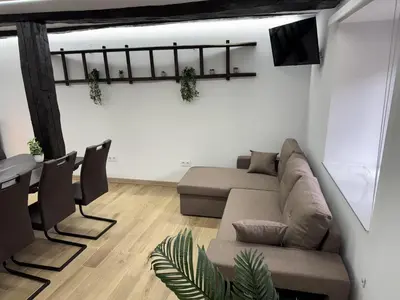 a living room with a couch and a table at Casa Lounge Xacobeo in Tríacastela