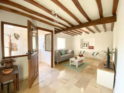 a living room with a couch and a table at Casa Pastur in Serantes