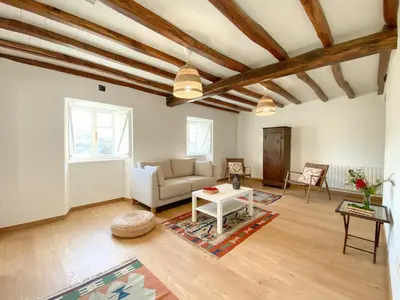 a living room with a couch and a table at Casa Pastur in Serantes