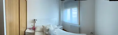 a living room with a couch and a window at Recuncho do Susiño in Foz