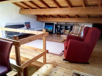 an overhead view of a living room with a loft at A Casa da Boa Xente VUT-OU-1329 in Verín