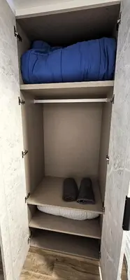 a cupboard with a mattress and a bed on it at Vacansis Santiago Garcia Prieto y Romero Donallo Habitaciones Privadas in Santiago de Compostela