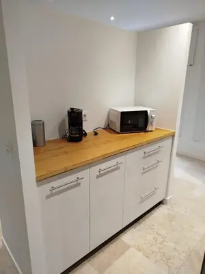 a kitchen with a counter with a microwave on it at XELIÑA d in A Estrada