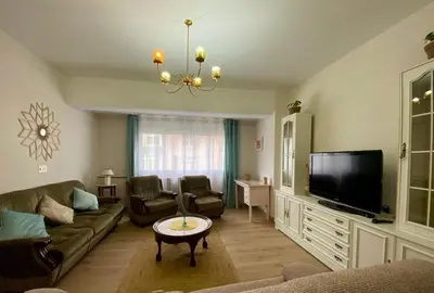 a living room with a couch and a tv at Parque de los Condes in Monforte de Lemos