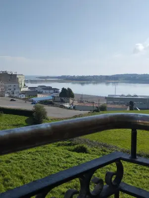 a view of a body of water from a balcony at Hollyfoz Arenal in Foz